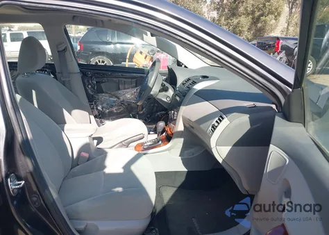 2009 Toyota Corolla Xle z USA, uszkodzony, nr VIN 1NXBU40EX9Z113312